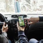 couple-consulting-gps-while-traveling